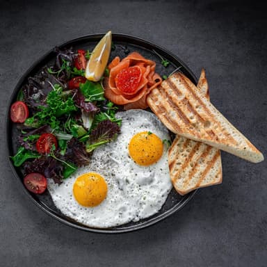 Fried Eggs with Salmon and Red Caviar